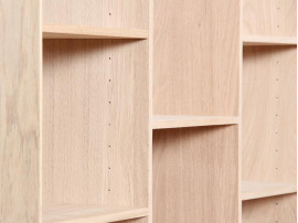 Modular Shelving System in oak. One single module and base